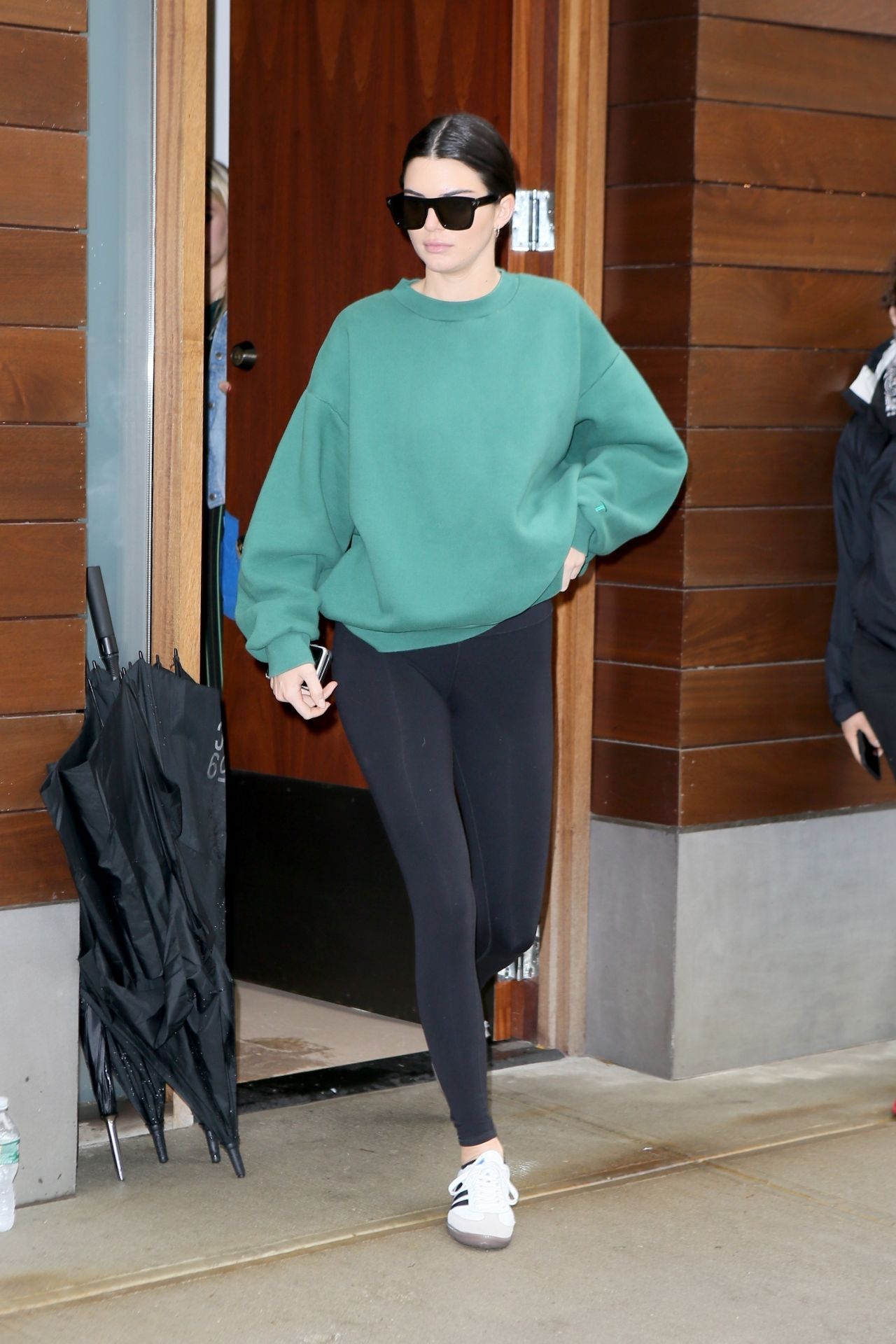 Kendall Jenner - Wearing Black Leggings and a Green Sweatshirt in NYC ...