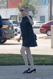 Kirsten Dunst in Mini Dress - Leaves Joan
