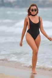 Laura Simpson Hot in Black Swimsuit on Beach in Majorca 10/02/2017