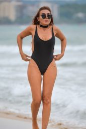 Laura Simpson Hot in Black Swimsuit on Beach in Majorca 10/02/2017