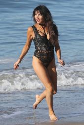 Lizzie Cundy in a Red and Black Swimsuit in Miami 10/25/2017