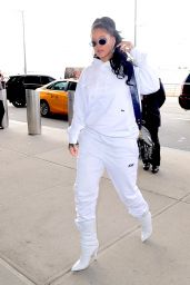 Rihanna in an all White Sweatsuit - Arriving at JFK Airport in New York City