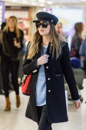 Dakota Johnson at Heathrow Airport in London 12/14/2017