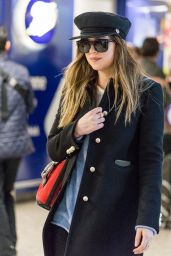 Dakota Johnson at Heathrow Airport in London 12/14/2017