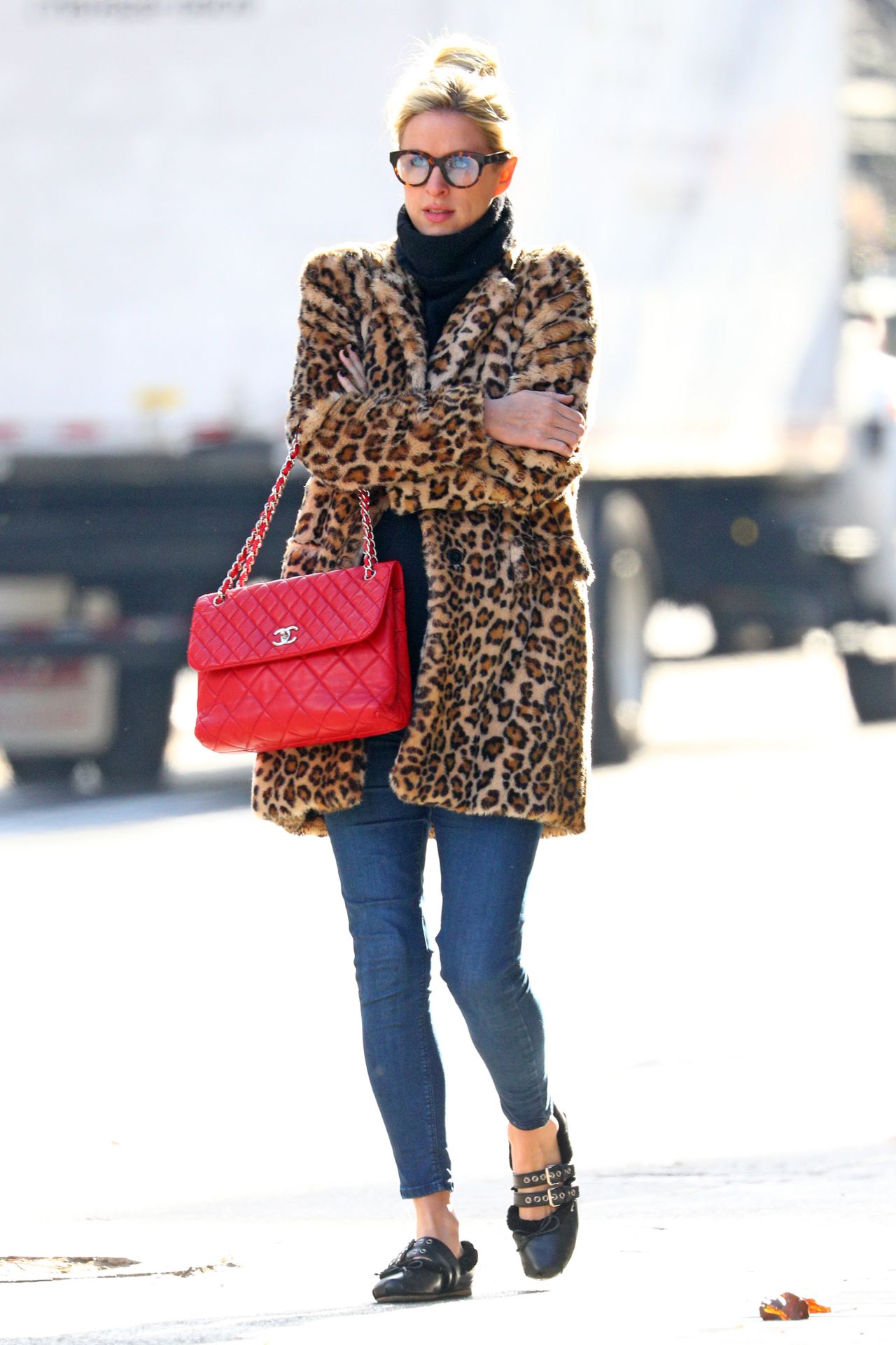 Nicky Hilton in a Leopard Print Coat and Red Chanel Handbag - NYC 12/06