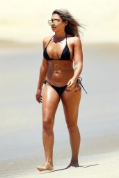 Noni Janur in a Black Bikini at a Beach in Sydney
