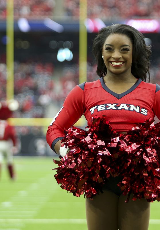 Simone Biles Performs With the Houston Texans Cheerleaders in Houston 12/10/2017