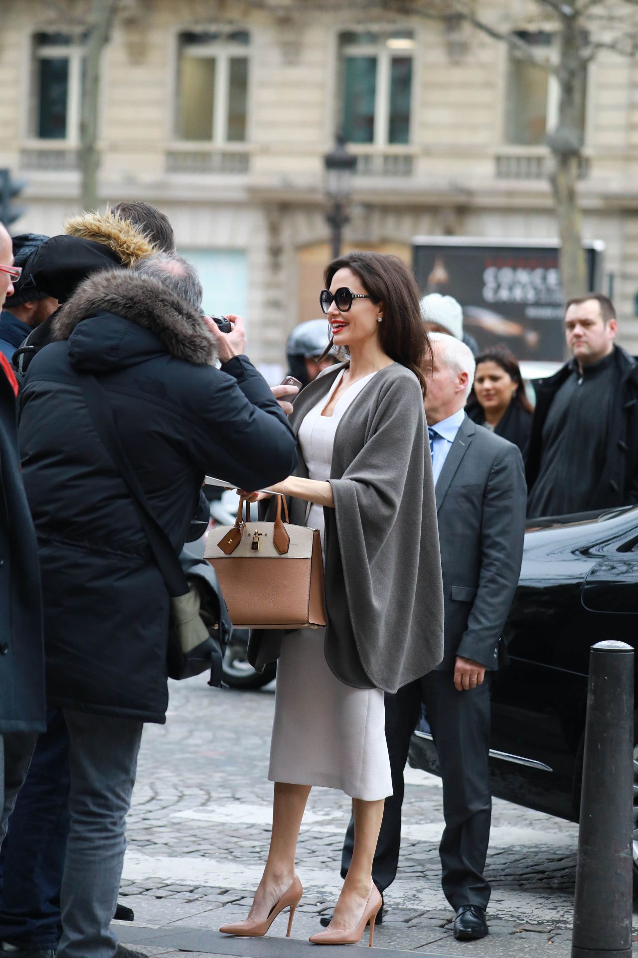 https://celebmafia.com/wp-content/uploads/2018/01/angelina-jolie-goes-to-guerlain-perfumes-shop-on-the-champs-elysees-in-paris-2.jpg