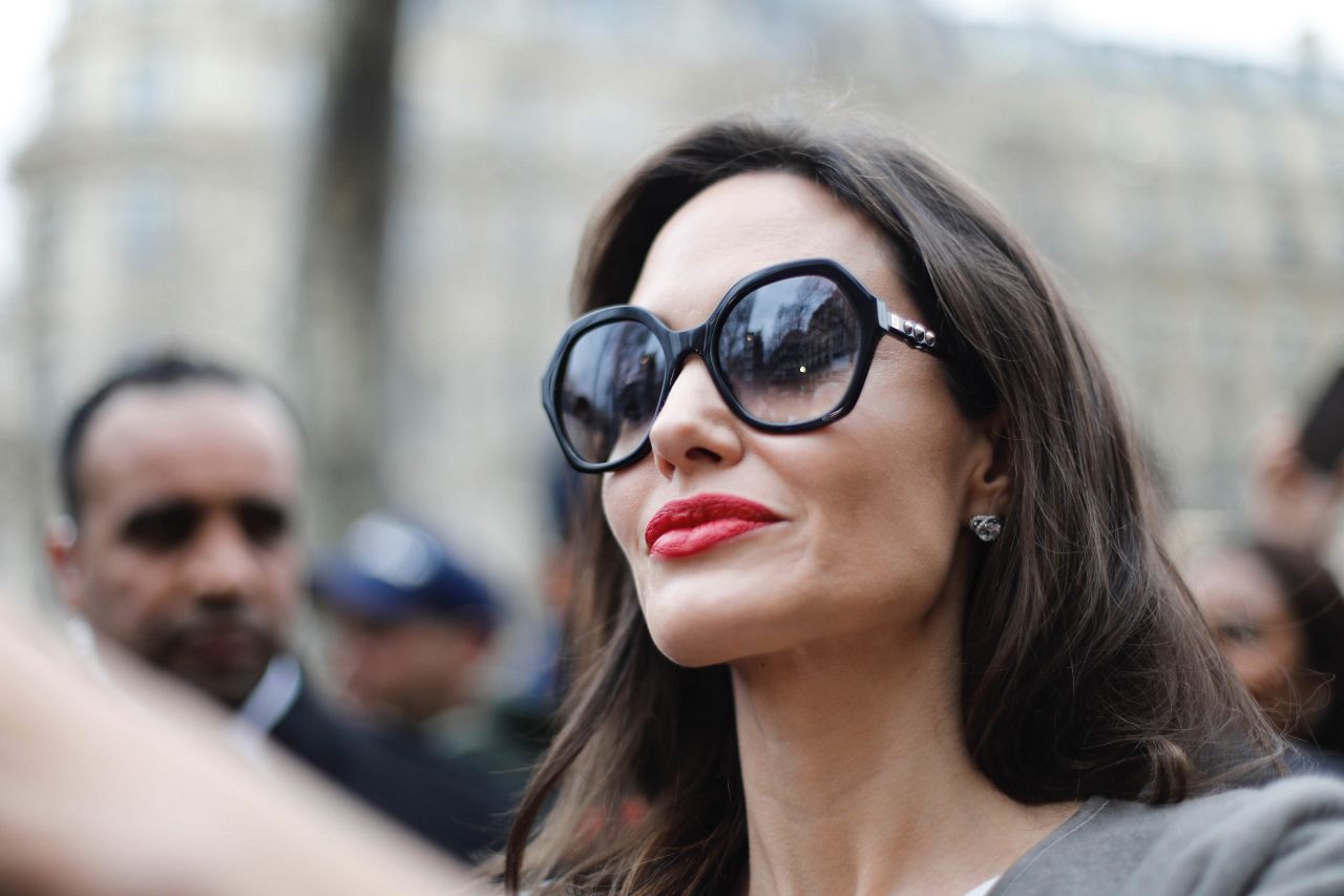 https://celebmafia.com/wp-content/uploads/2018/01/angelina-jolie-goes-to-guerlain-perfumes-shop-on-the-champs-elysees-in-paris-3.jpg