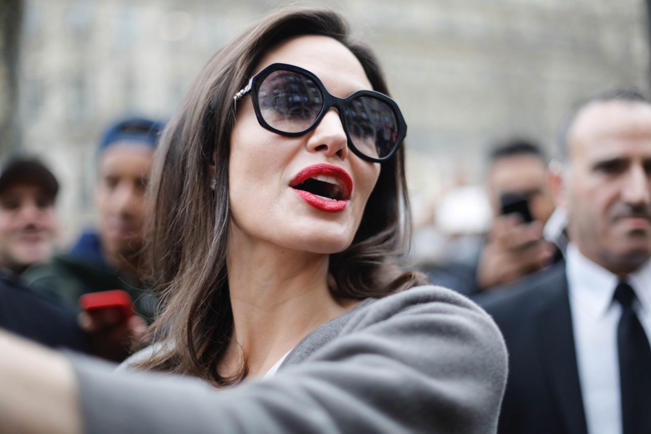 https://celebmafia.com/wp-content/uploads/2018/01/angelina-jolie-goes-to-guerlain-perfumes-shop-on-the-champs-elysees-in-paris-7.jpg