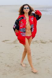 Blanca Blanco in a Red Racing Jacket and Matching Bikini Bottoms