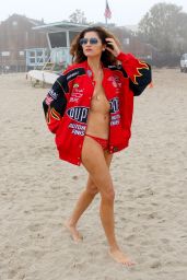 Blanca Blanco in a Red Racing Jacket and Matching Bikini Bottoms