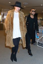 Chrissy Teigen in Travel Outfit at Narita International Airport in Tokyo