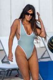 Claudia Romani in a Baby Blue Swimsuit on South Beach in Miami