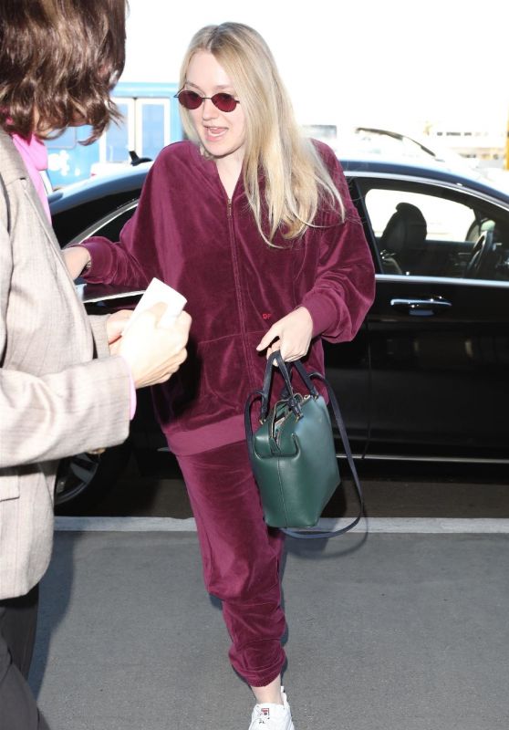 Dakota Fanning in Travel Outfit at LAX Airport in Los Angeles