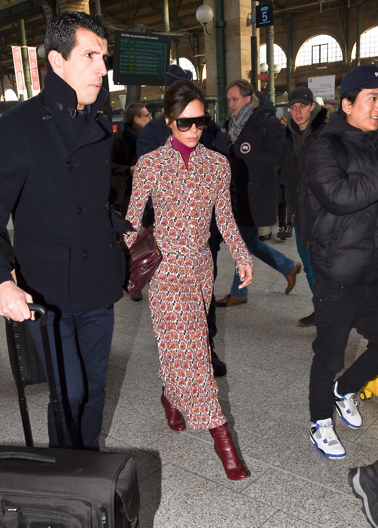 David and Victoria Beckham Arriving in Paris 01/17/2018 • CelebMafia