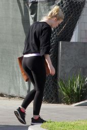 Elle Fanning in Tights Returning to Her Home in Los Angeles