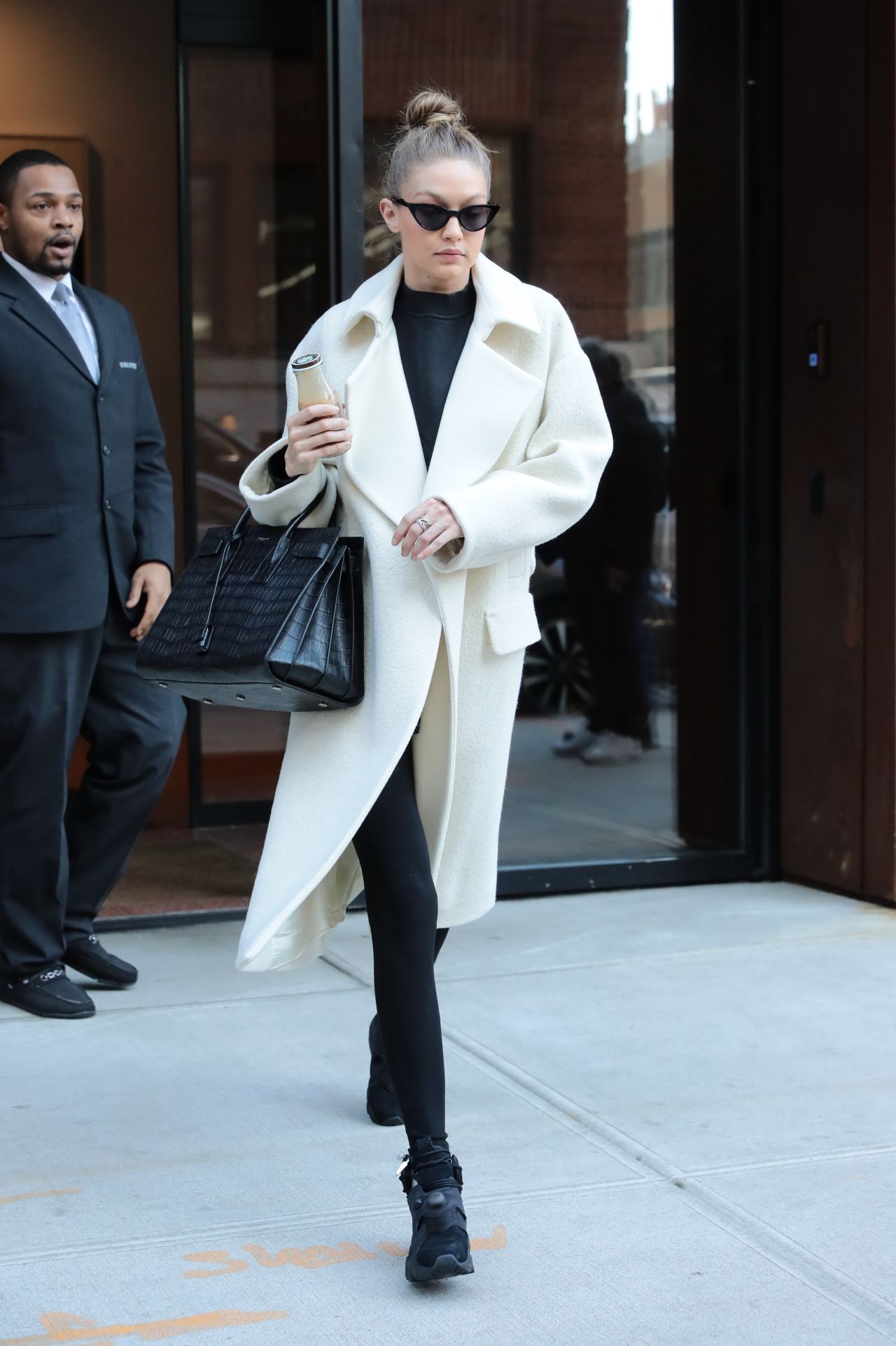 Gigi Hadid is Stylish in White and Black - Leaving Her Home in NYC ...