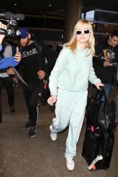 Elle Fanning in Travel Outfit - Returns to Los Angeles 02/21/2018