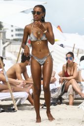 Jasmine Tookes in Bikini Sunbath at the Beach in Miami