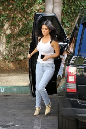 Kourtney Kardashian in a White Tank, Blue Jeans and a Pair of Snake Skin Heels - Sherman Oaks