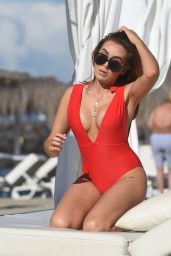 Laura Simpson in a Red Swimsuit on the Beach in the Canary Islands