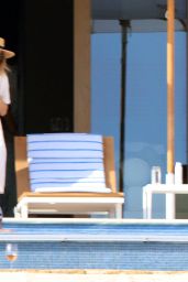 Molly Sims Sits Poolside in Cabo San Lucas