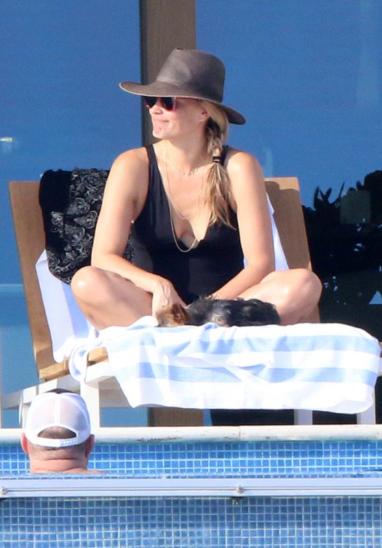 Molly Sims Sits Poolside in Cabo San Lucas