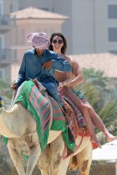 Danielle Lloyd in Bikini - Camel Riding On Beaches of Dubai