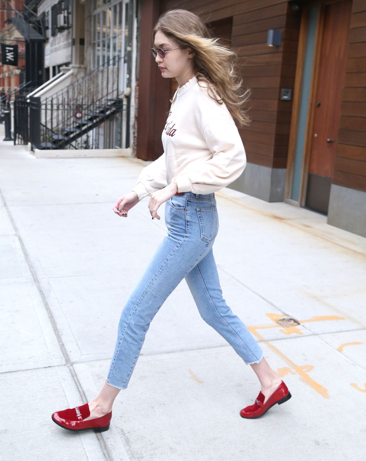 Gigi Hadid Pina Colada Sweatshirt and Red Shoes For Less - The Budget Babe