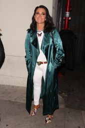 Kyle Richards in a Green Trench Coat and White Jeans at Craig