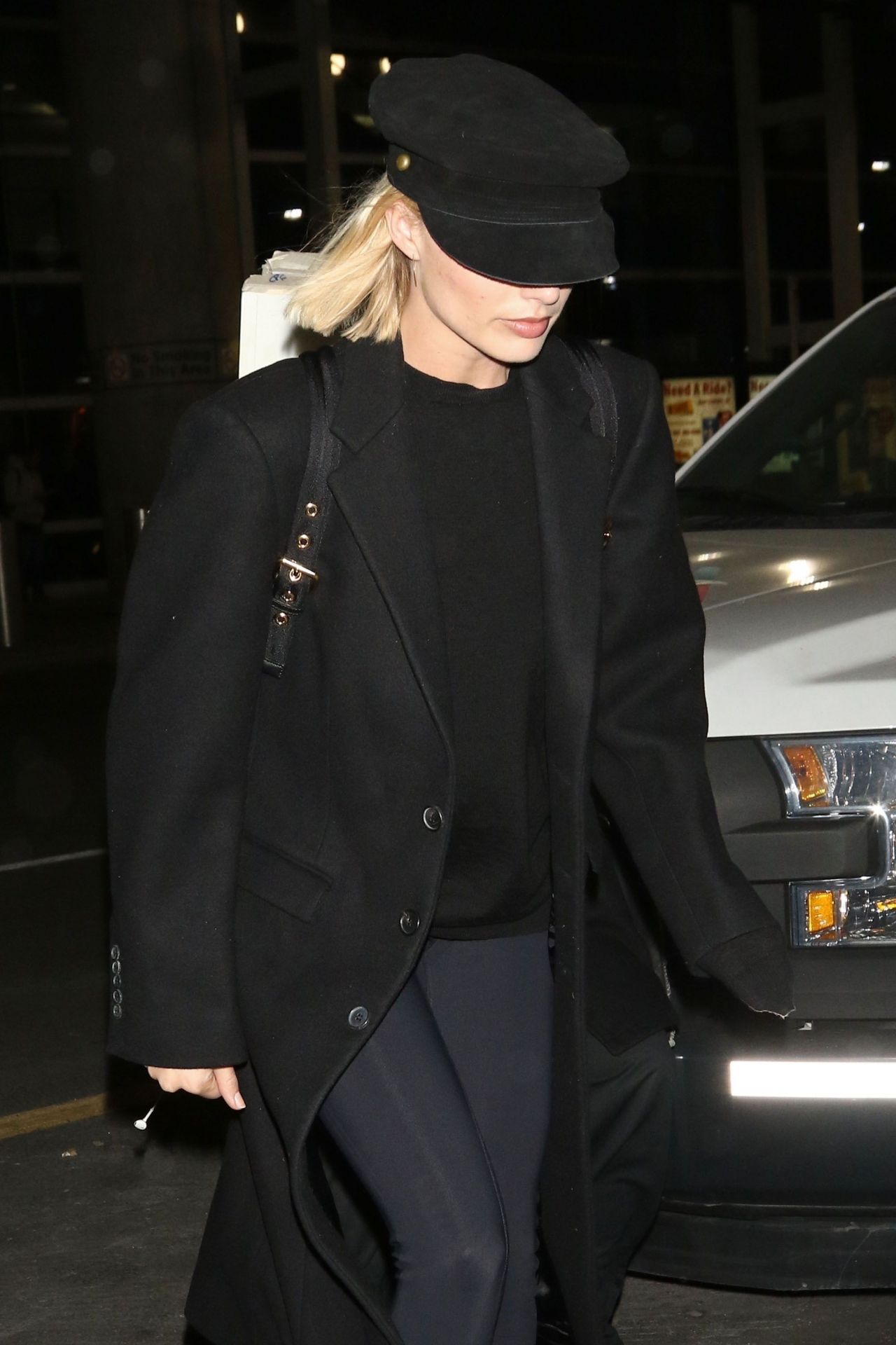 Margot Robbie Hides Under Her Hat - JFK Airport in NY 03/10/2018 ...