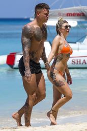 Olivia Buckland in a Orange Swimsuit in Barbados 03/13/2018