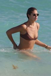 Annie McGinty in a Brown Bikini in the Ocean in Miami Beach 04/04/2018