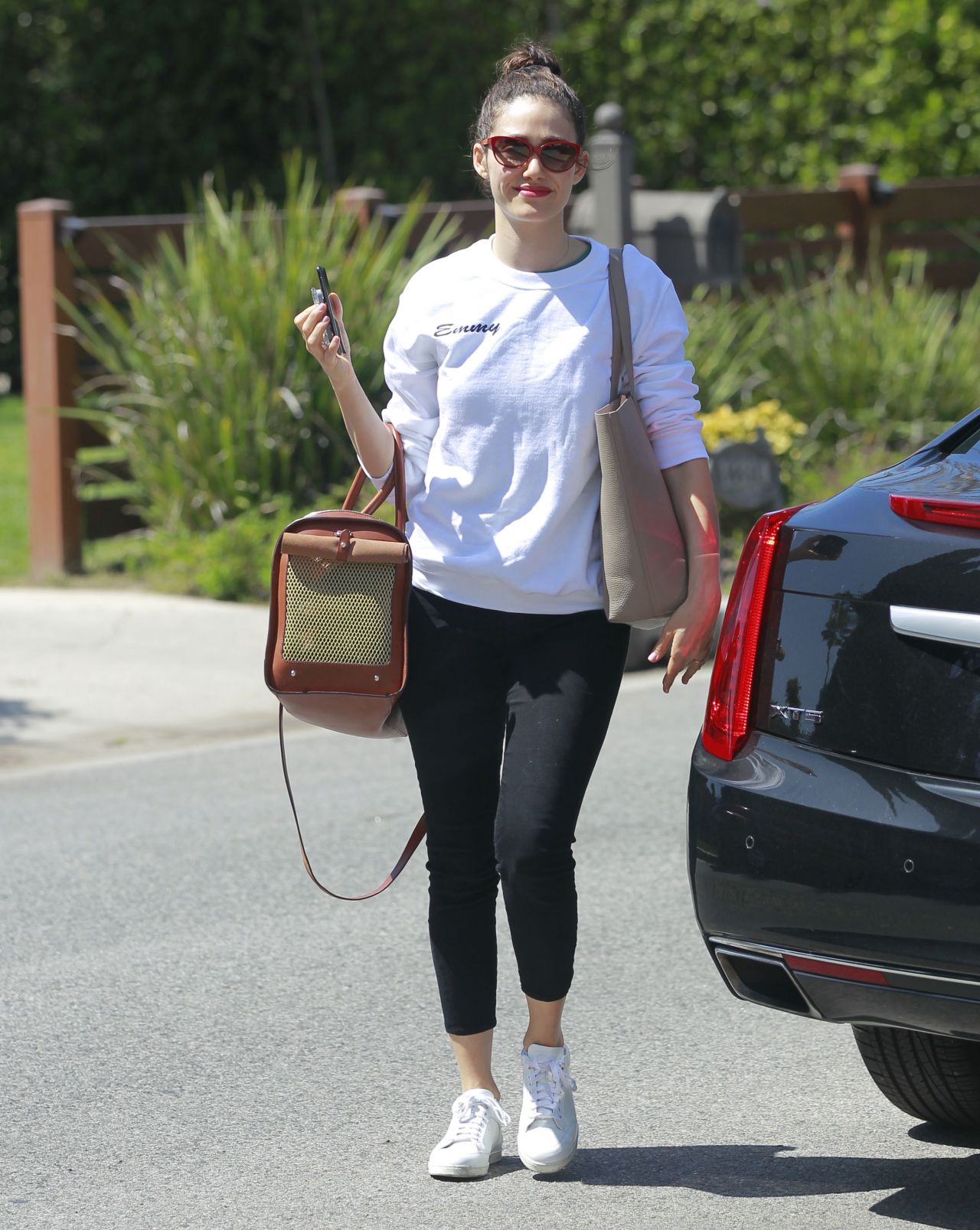 Emmy Rossum - With Her Dog in a Pet Purse in Hollywood 04/11/2018 ...