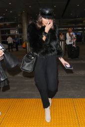 Olivia Culpo - Wearing a Furry Black Crop Top and Black Captain Hat - LAX in LA