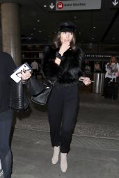 Olivia Culpo - Wearing a Furry Black Crop Top and Black Captain Hat - LAX in LA