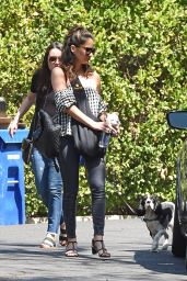Olivia Munn - Carrying Her Dog Around Her Chest in a Dog Pouch - Los Angeles 04/10/2018