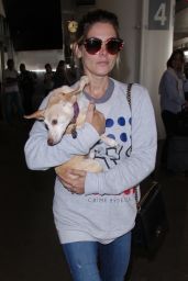 Ashley Greene - Carrying Her Dog Through LAX Airport in LA 05/23/2018