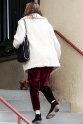 Rachael Taylor in a Red Velvet Ensemble Walking Her Dog in LA 05/12/2018