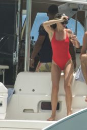 Abbey Clancy in a Red Swimsuit on a Catamaran in Barbados, June 2018