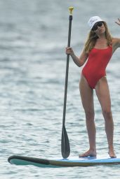 Abbey Clancy in a Red Swimsuit on a Catamaran in Barbados, June 2018