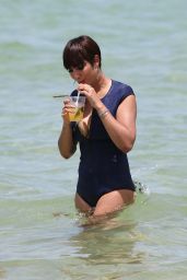 Jackie Cruz in a Plunging Duskii Swimsuit on Miami Beach 06/17/2018