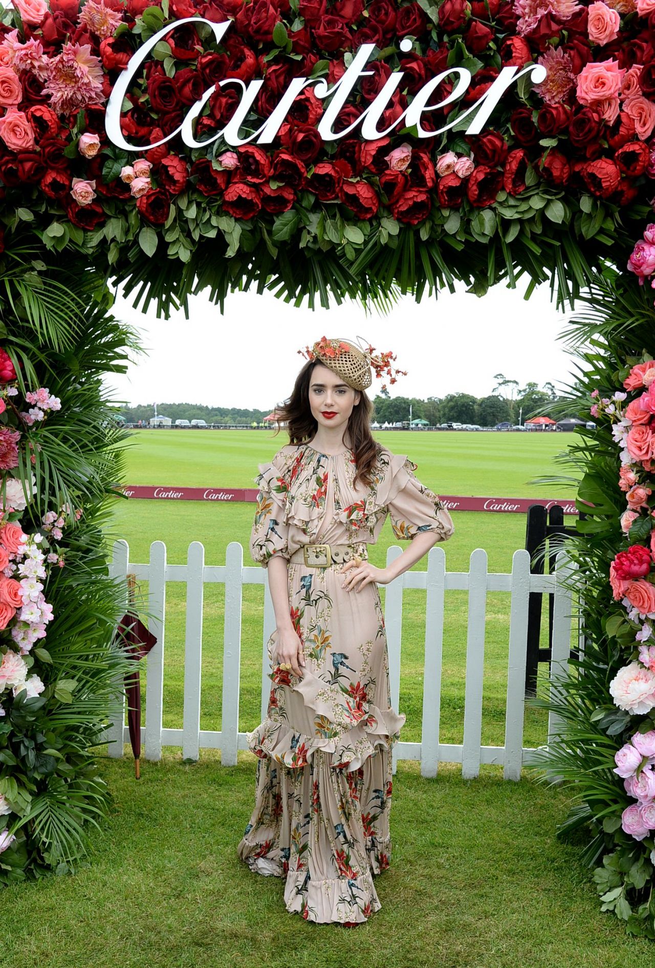https://celebmafia.com/wp-content/uploads/2018/06/lily-collins-cartier-queens-cup-polo-in-windsor-06-17-2018-13.jpg
