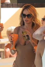 Rhian Sugden in a Gold Swimsuit at Ibiza