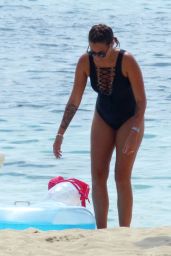 Angel Flukes in a Black Swimsuit on a Beach in Palma, Spain 07/12/2018