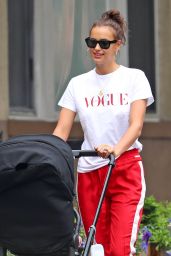 Irina Shayk in a Vogue T-Shirt and Bright Red Tracksuit Pants in NYC