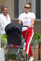 Irina Shayk in a Vogue T-Shirt and Bright Red Tracksuit Pants in NYC