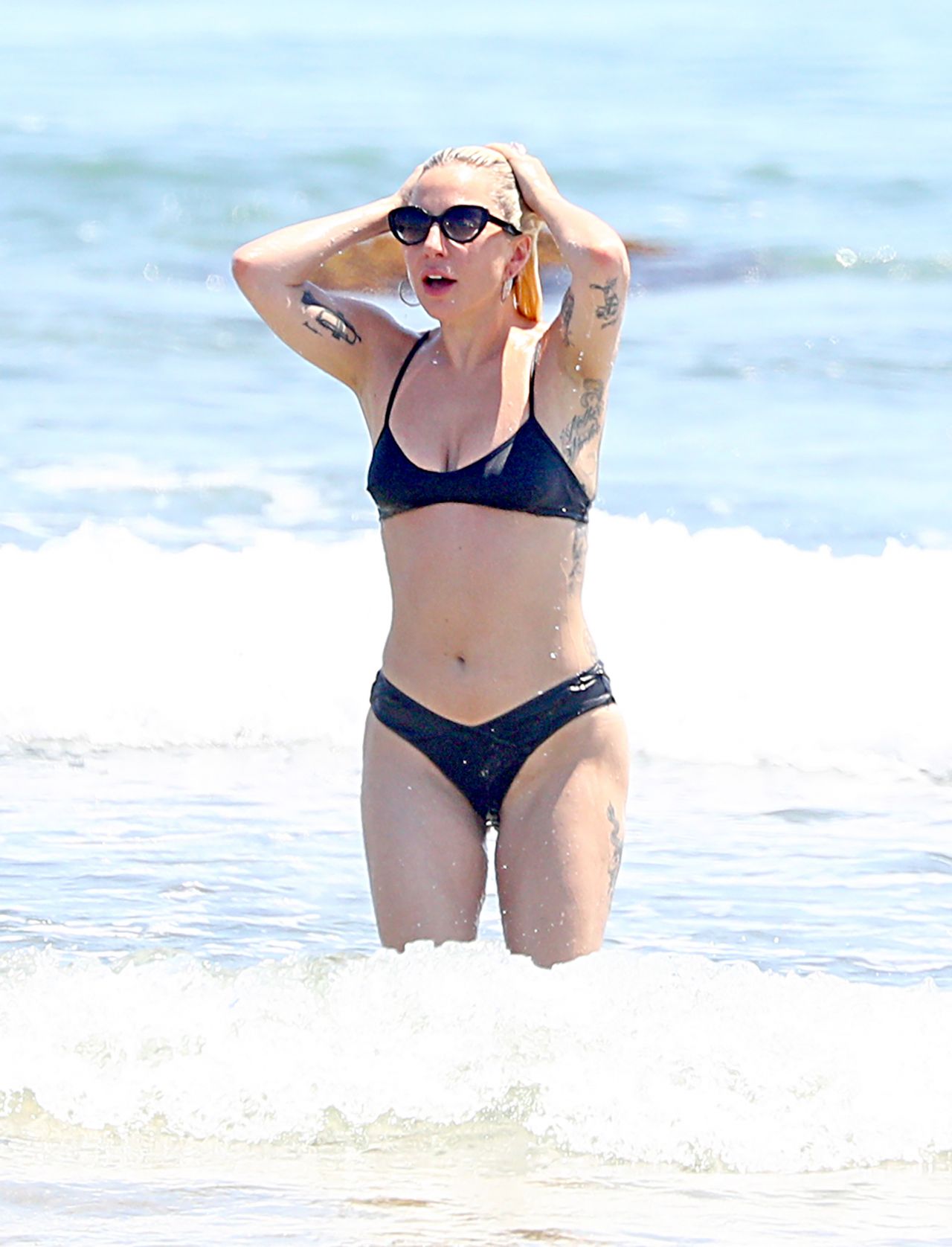 Lady Gaga in a Black Two Piece Bikini in the Hamptons 07/01/2018.
