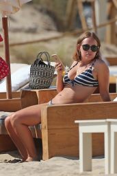 Tanya Burr in Bikini - Beach in Ibiza 07/24/2018